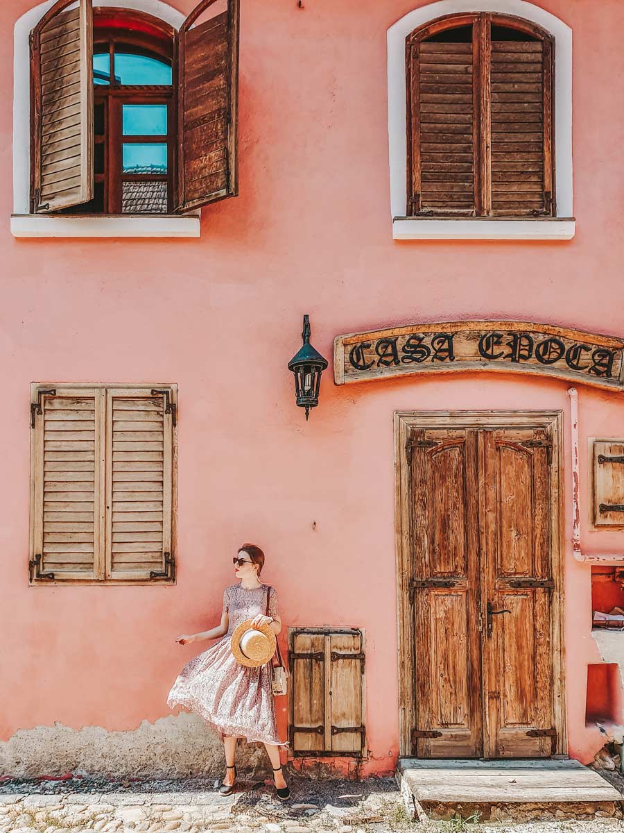 flipping the dress pose sighisoara